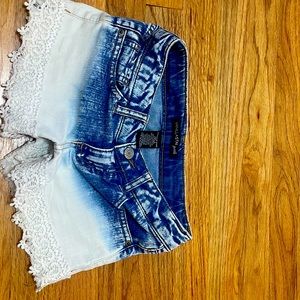 Im selling jeans shorts. They are blue and white. So cute. From vanilla star!